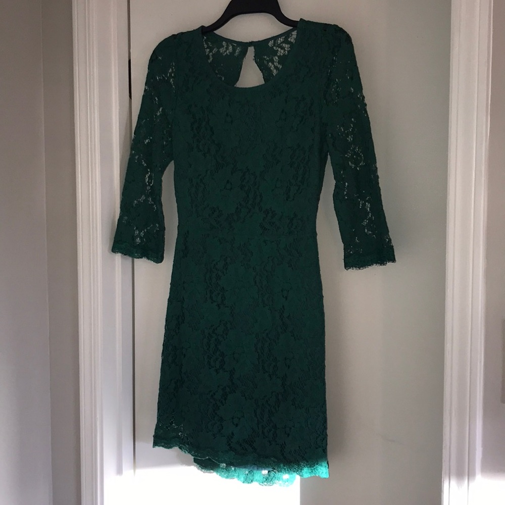 Green lace open back dress